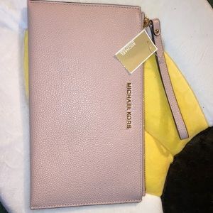 Michael Kors large zip clutch blossom leather